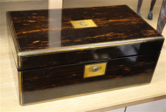 A Victorian coromandel and brass mounted writing slope, with hidden compartment and keys, with Bramah lock